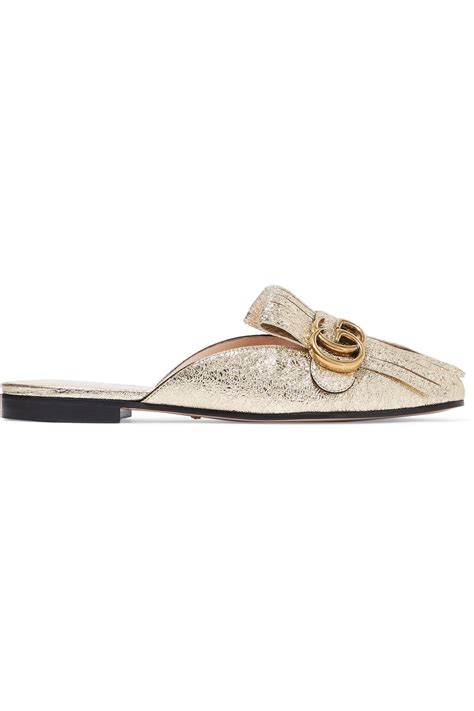 gold gucci mules for women.